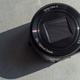 Image for article titled Sony QX1: A Weird Interchageable-Lens Camera You Strap to Your Phone